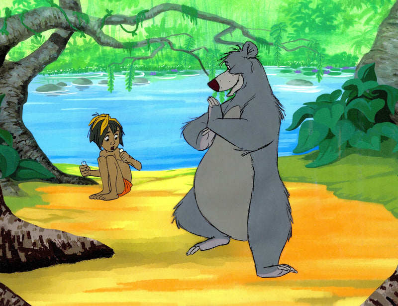 The Jungle Book Original Production Cel with Disneyland Art Corner: Mowgli and Baloo (Framed)